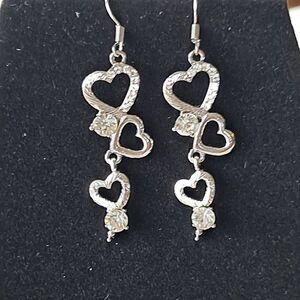 6 pair silvertone heart earrings Nwt